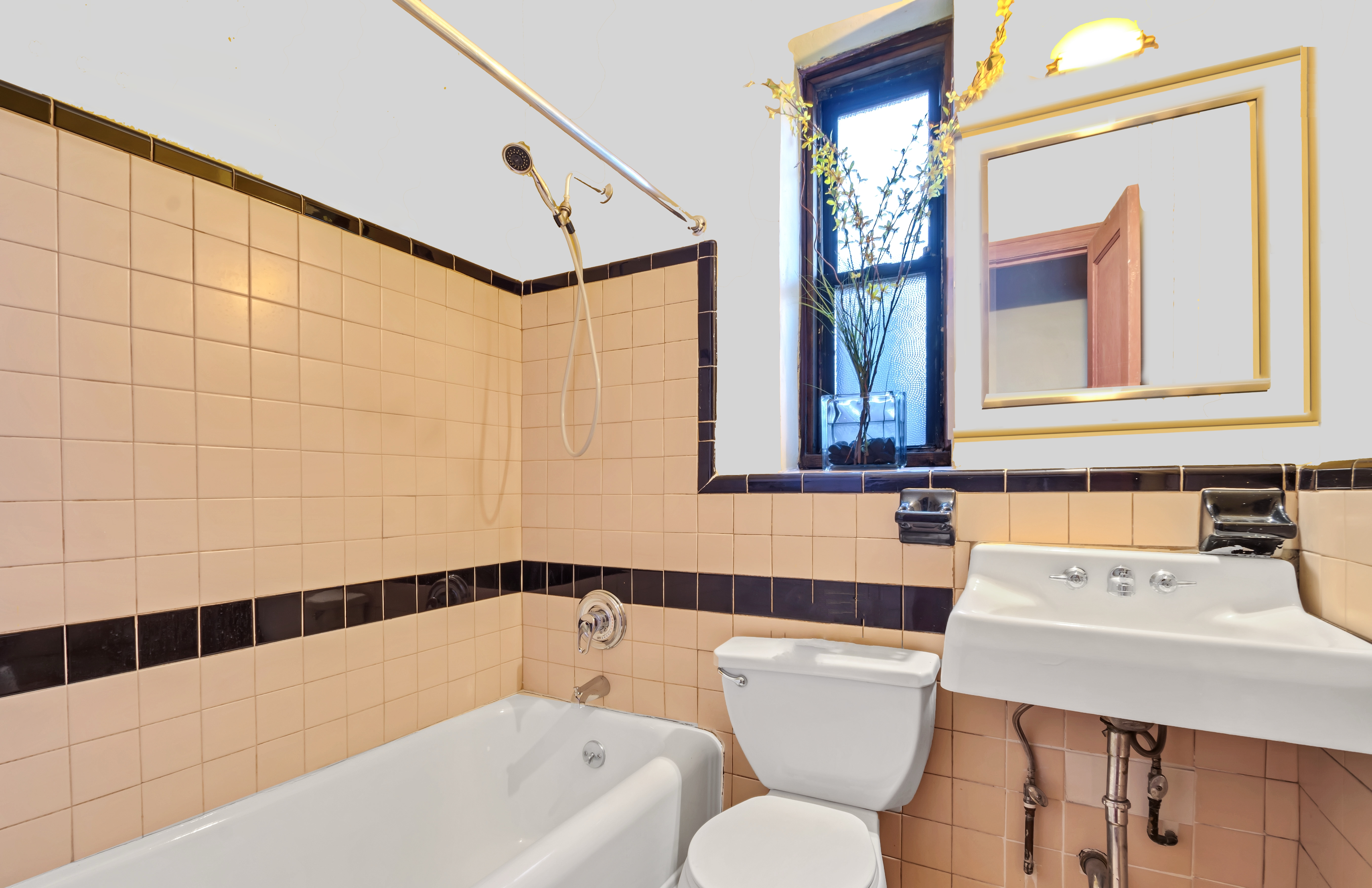 94 Hamilton Place, Unit 5E Manhattan, NY 10031 - Photo 8 of 13 a bathroom with a sink a toilet and shower