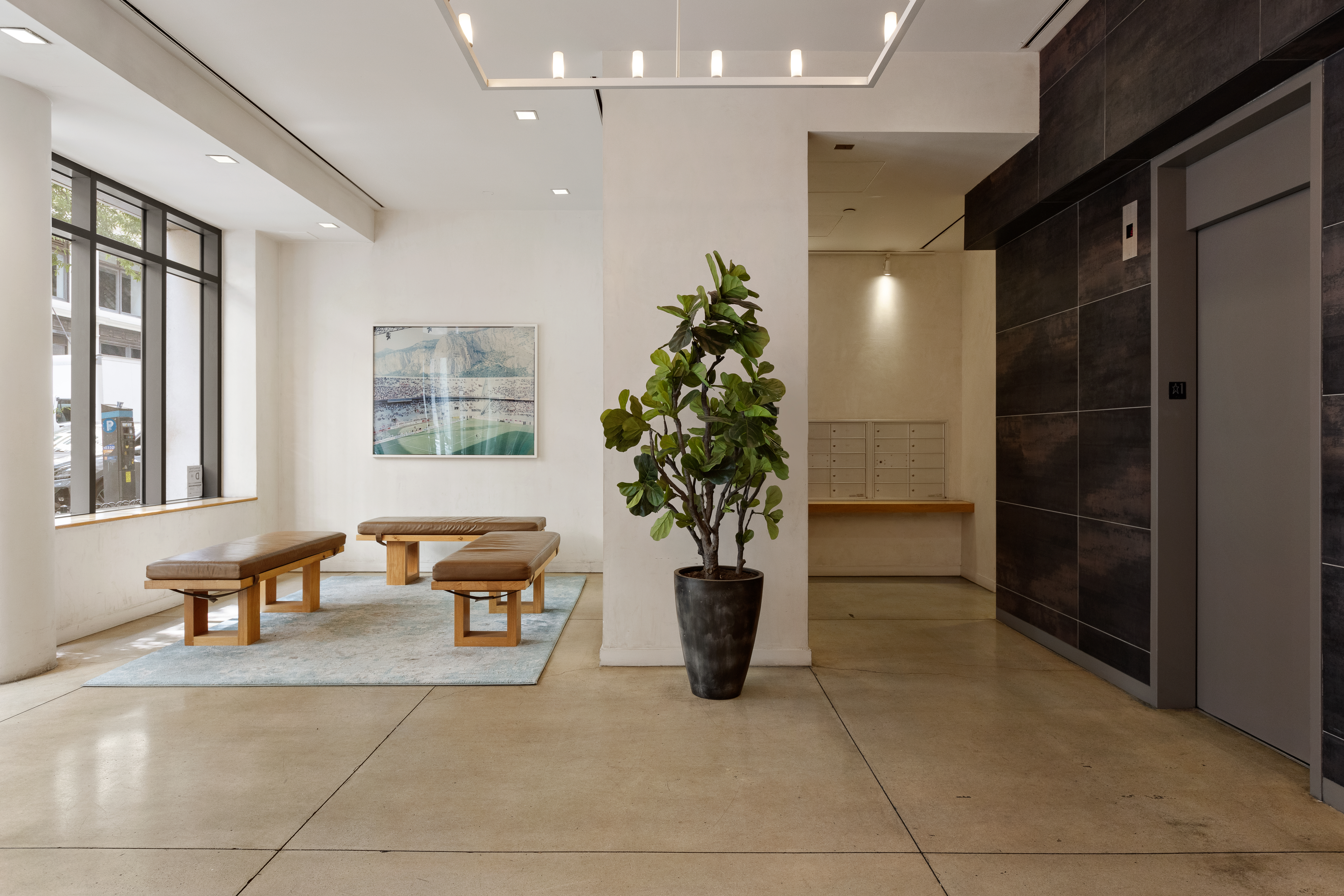 4 West 21st Street, Unit 16A Manhattan, NY 10010 - Photo 10 of 15 a lobby with furniture and potted plants