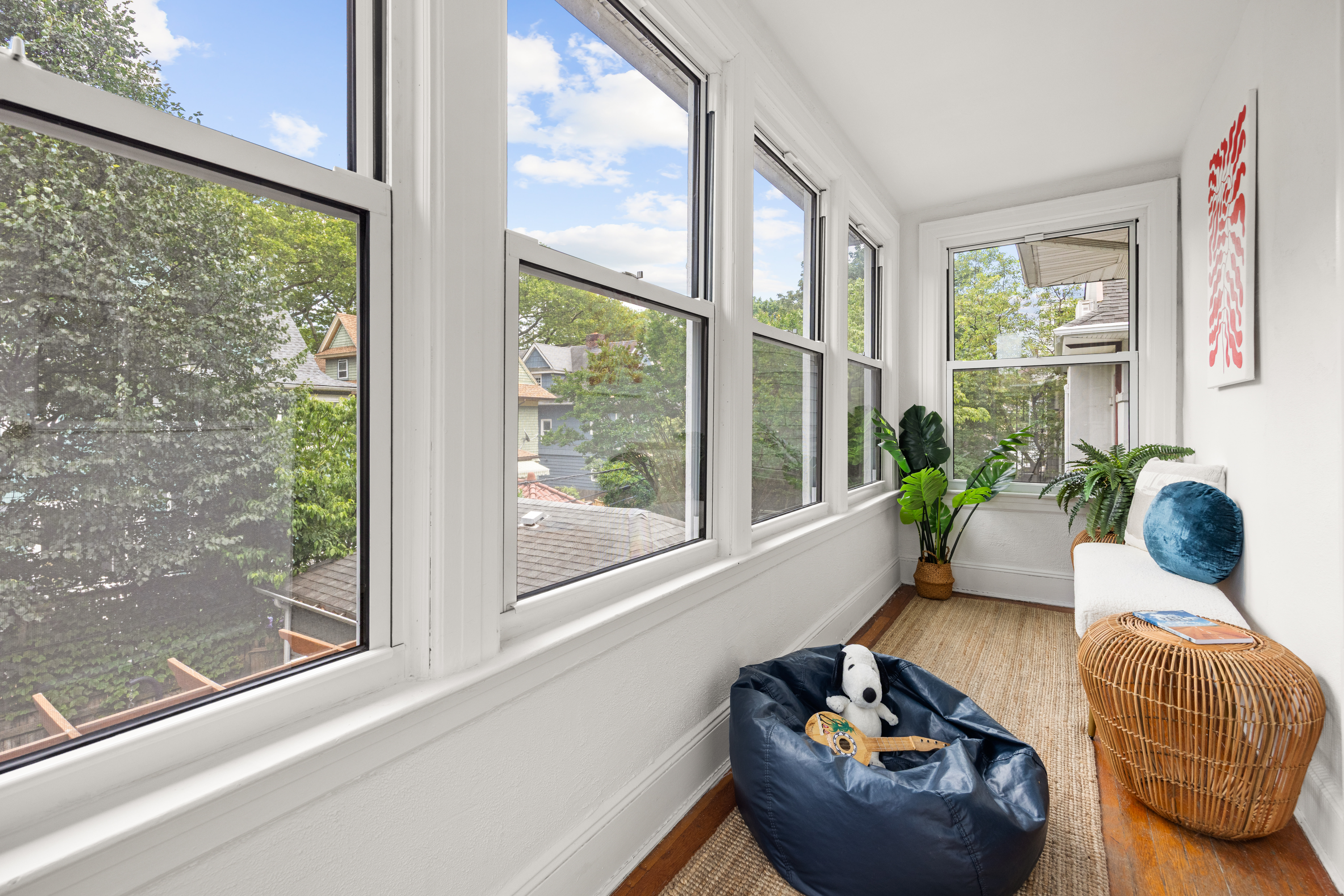481 Stratford Road Brooklyn, NY 11218 - Photo 17 of 25 a living room with furniture and a potted plant