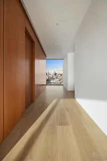 a view of a kitchen with a refrigerator
