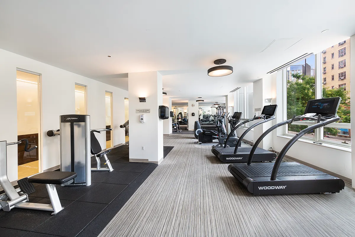 300 East 23rd Street, Unit 7A Manhattan, NY 10010 - Photo 14 of 15 a view of a room with gym equipment