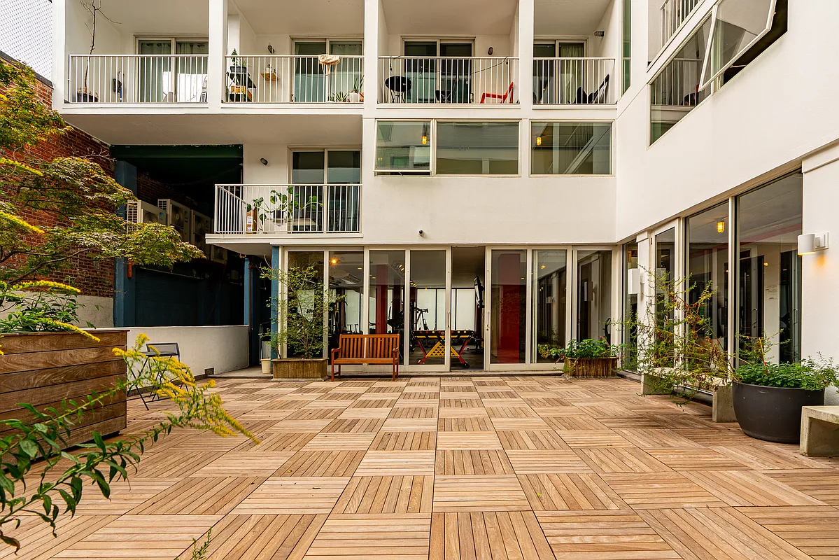 a front view of a building with a outdoor space