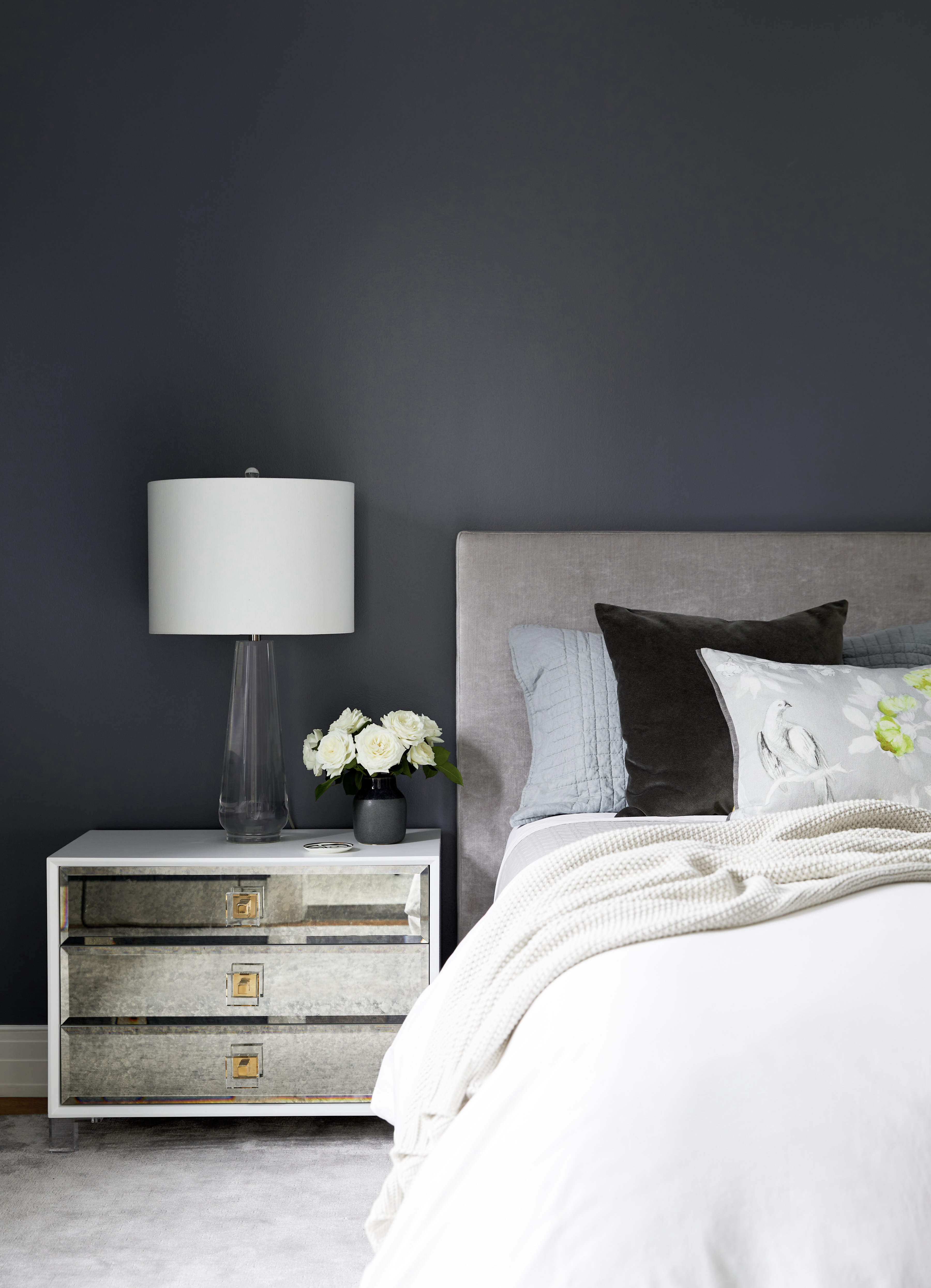 235 West 75th Street, Unit 505 Manhattan, NY 10023 - Photo 17 of 23 a bedroom with a bed and a lamp on table