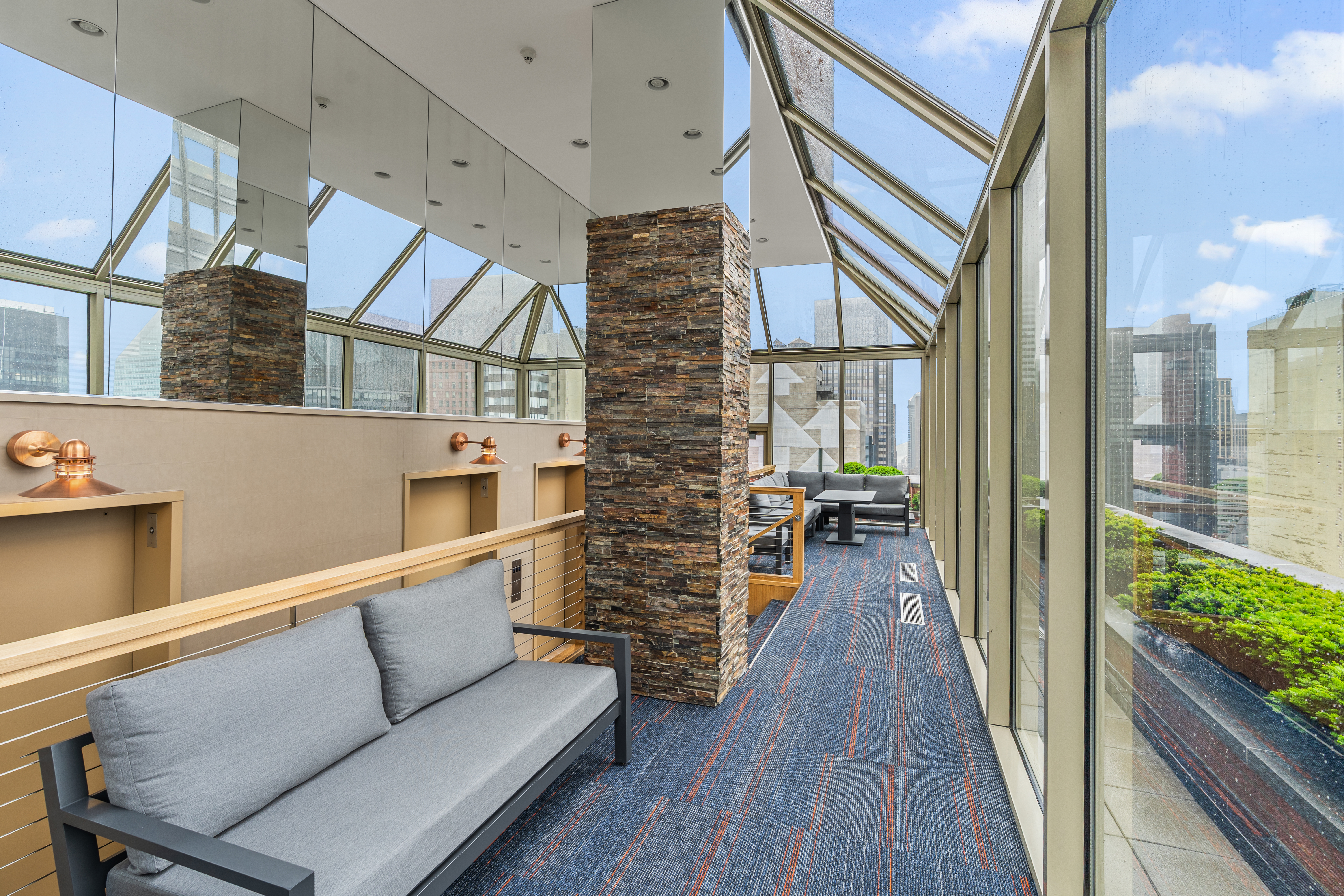 236 East 47th Street, Unit 17C Manhattan, NY 10017 - Photo 7 of 11 a living room with furniture and a wooden floor