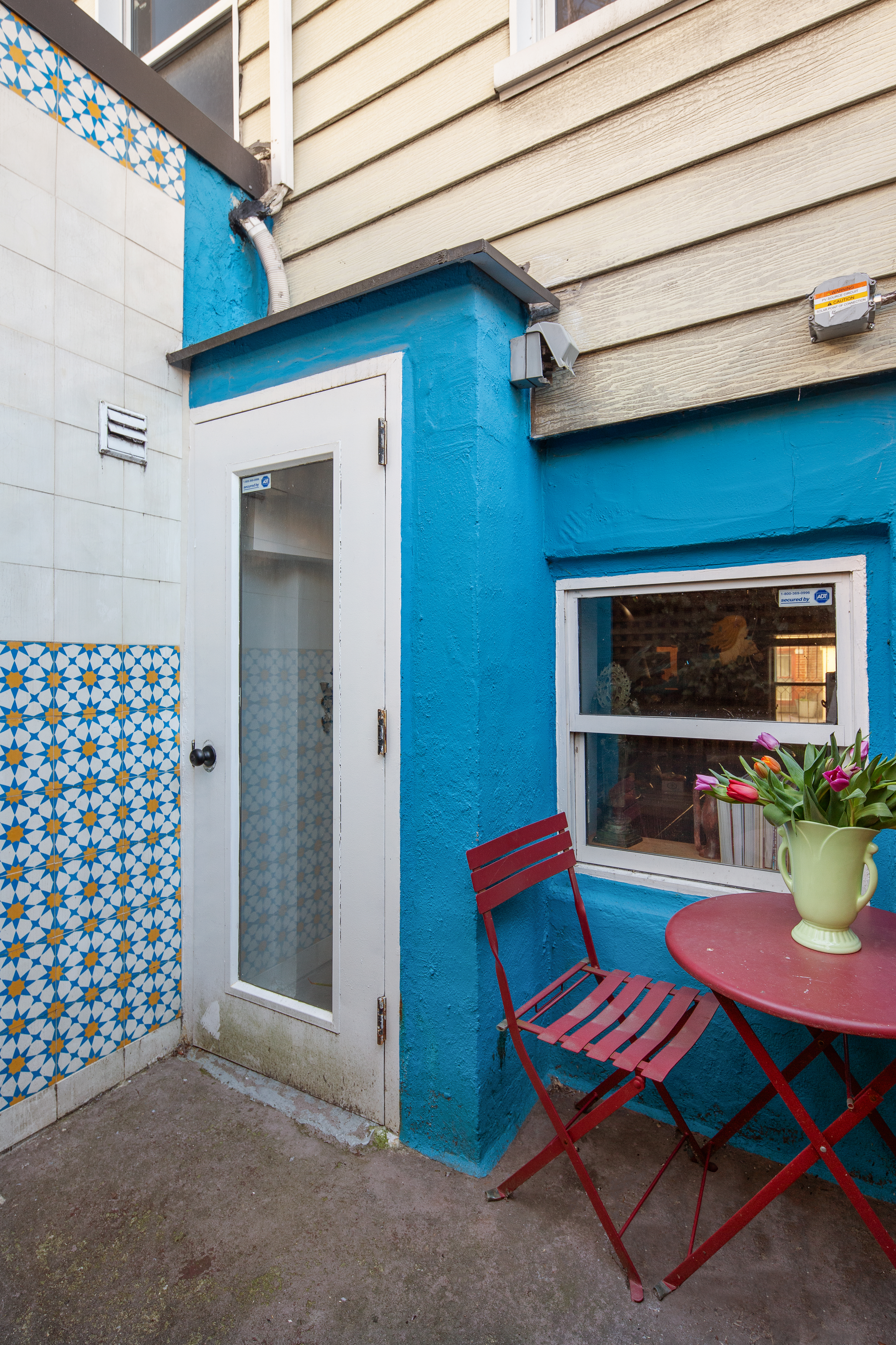 11 Sylvan Terrace Manhattan, NY 10032 - Photo 15 of 16 a backyard of a house with outdoor seating