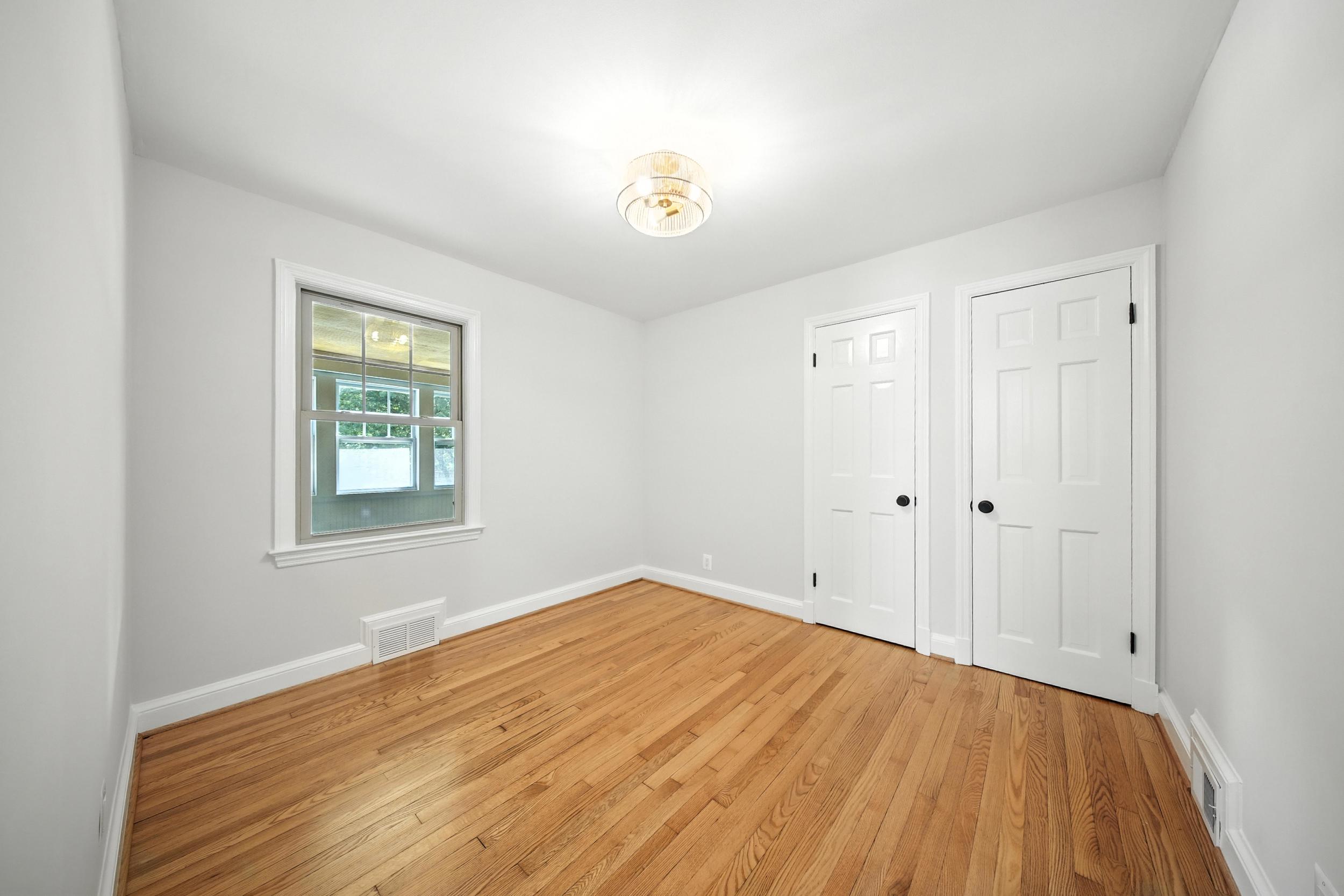 4505 Park Road Alexandria, VA 22312 - Photo 39 of 80 a view of empty room with wooden floor and fan