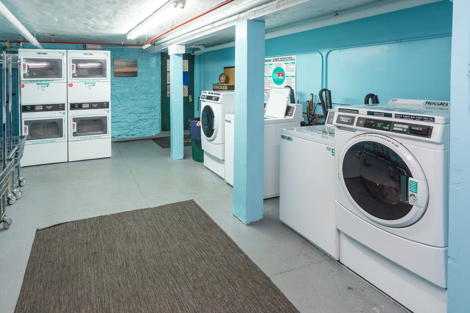 a view of a storage & utility room with washer and dryer