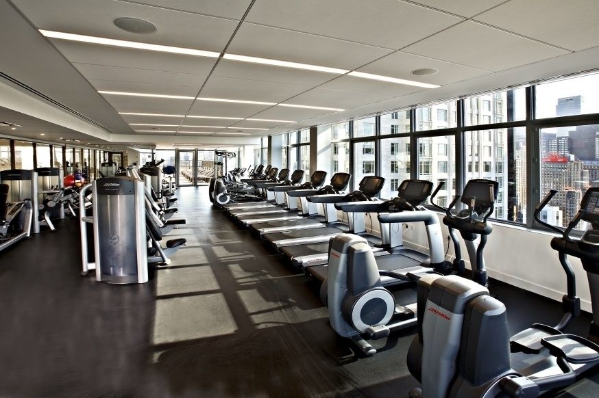 30 West 63rd Street, Unit 28L Manhattan, NY 10023 - Photo 6 of 11 a view of a room with gym equipment