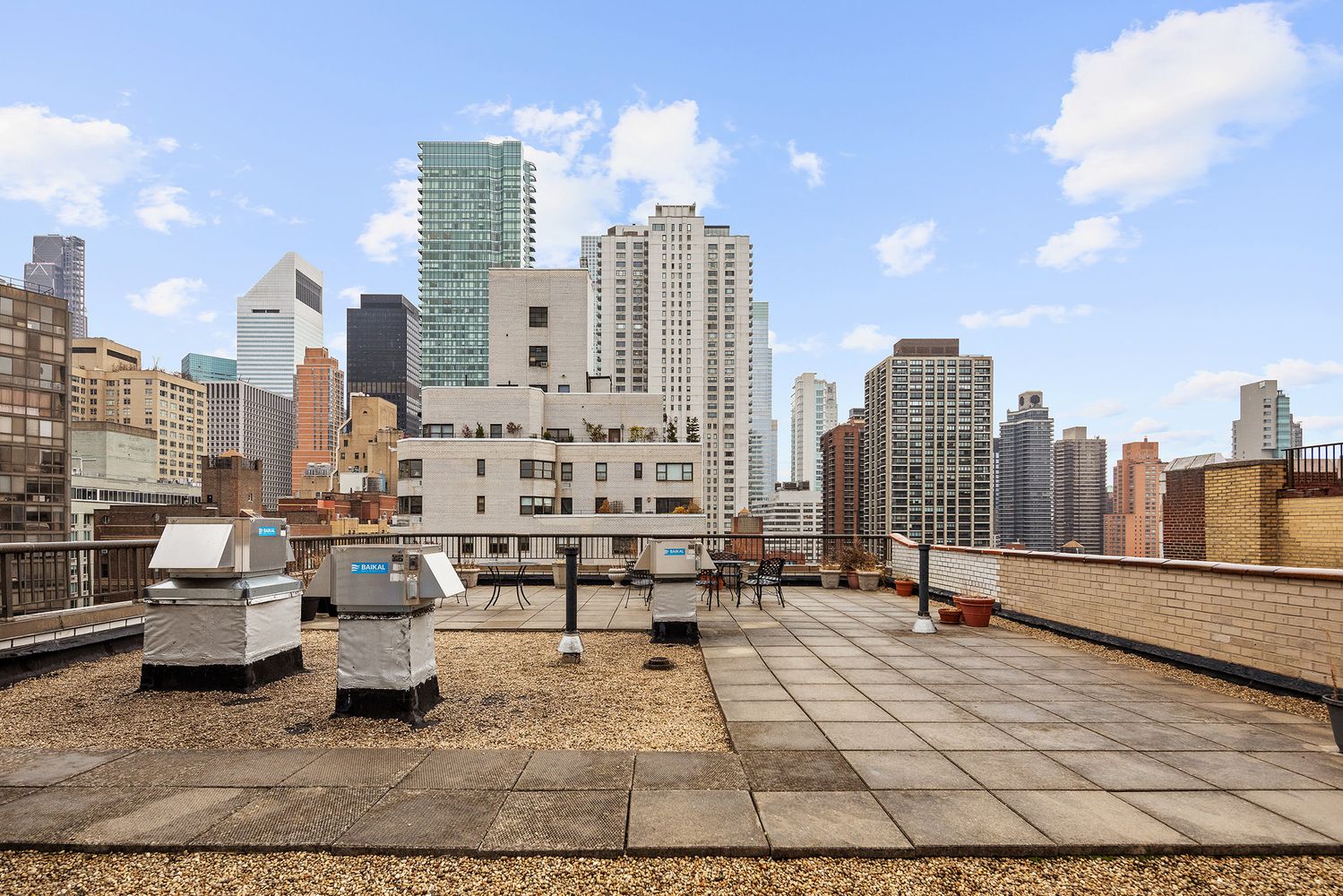 a view of city with tall buildings