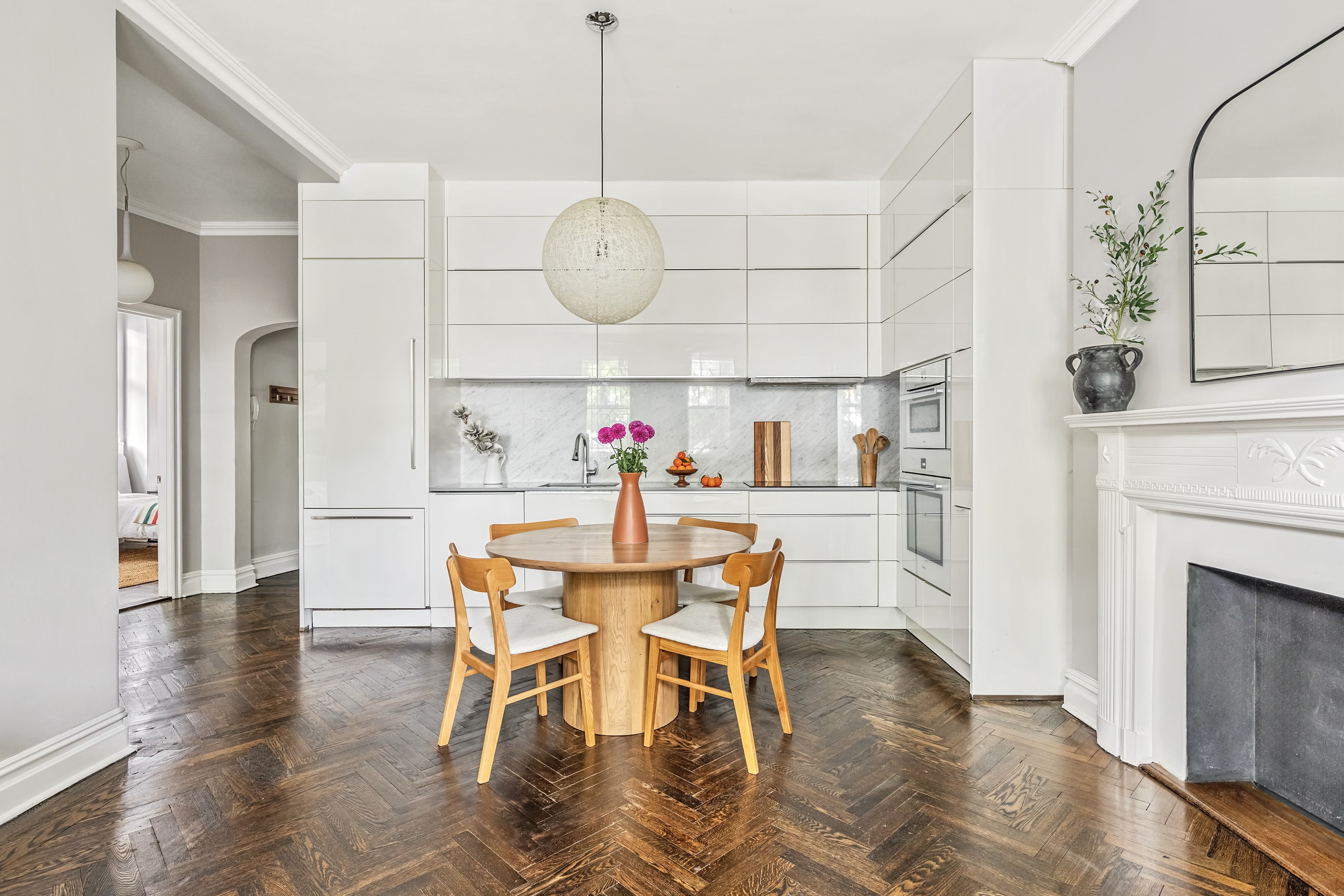 5 Riverside Drive, Unit 1C Manhattan, NY 10023 - Photo 3 of 11 a view of a dining room with furniture wooden floor and chandelier