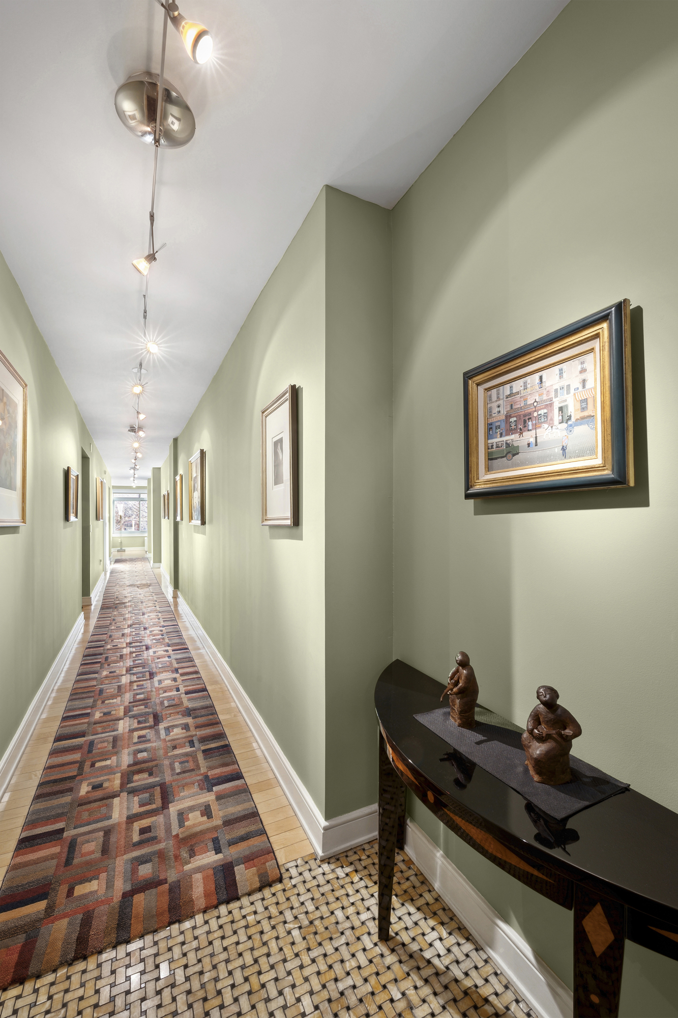 99 Jane Street, Unit 4H Manhattan, NY 10014 - Photo 16 of 22 a living room with furniture and a rug
