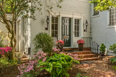 front view of a house with a yard