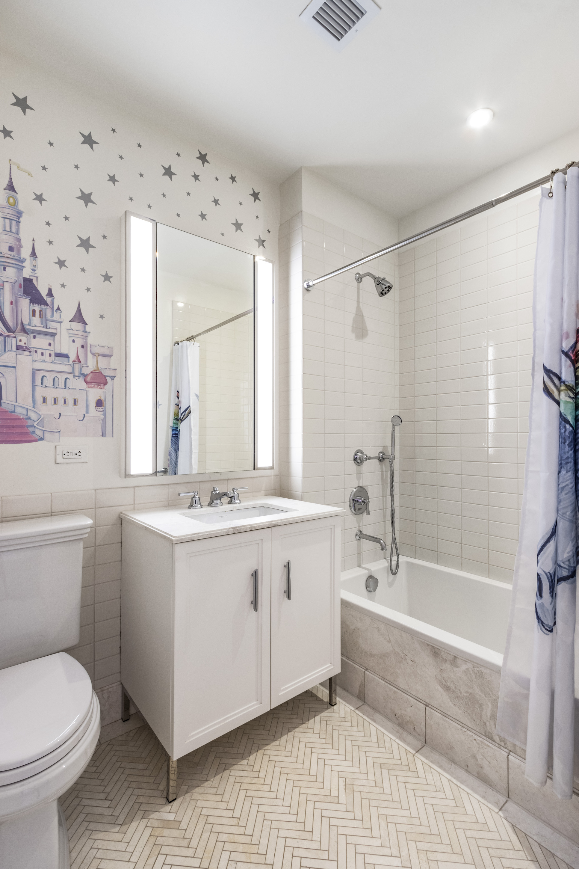 100 Barclay Street, Unit 15P Manhattan, NY 10007 - Photo 15 of 34 a bathroom with a granite countertop sink mirror vanity bathtub and a toilet
