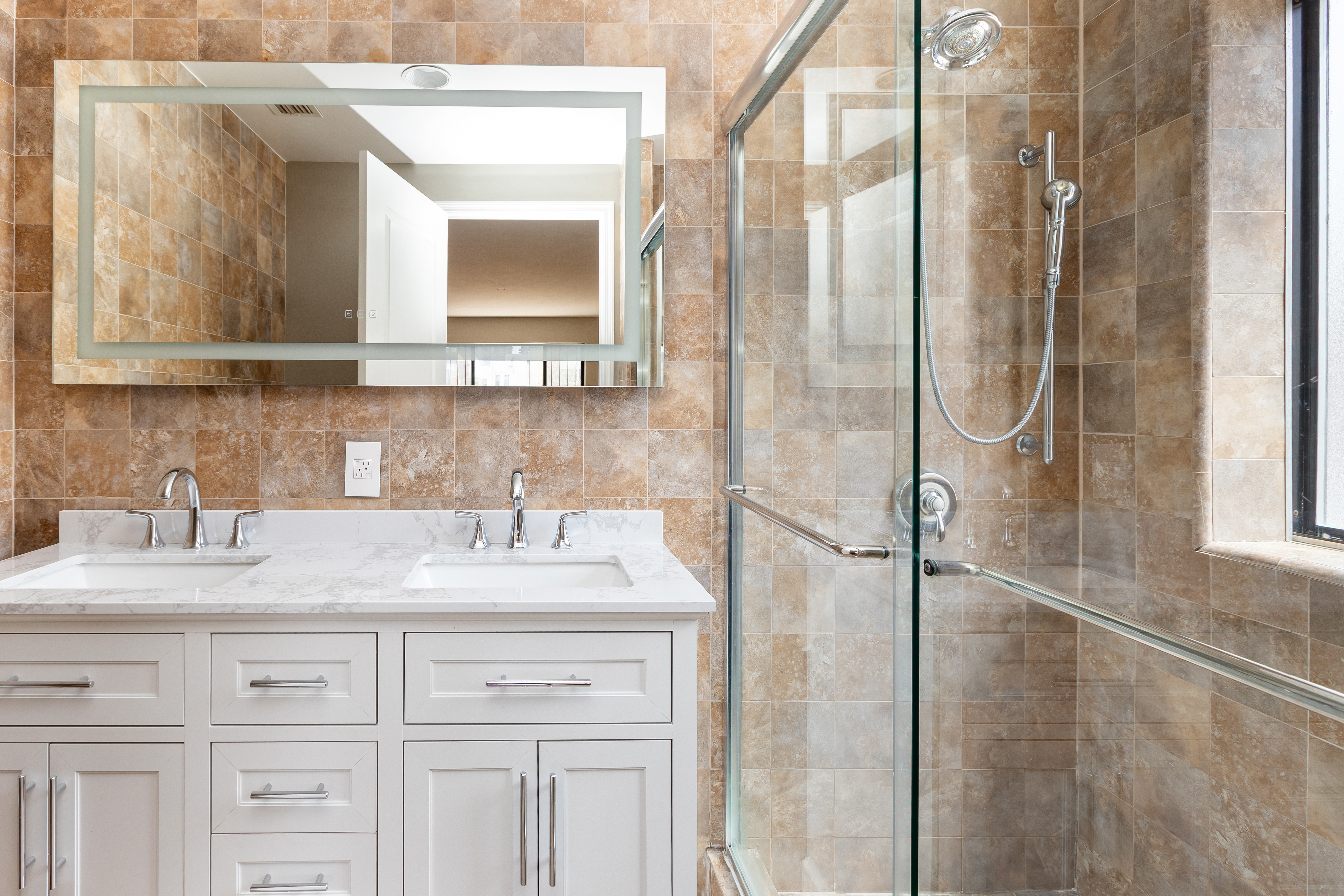 416 East 117th Street, Unit 5A Manhattan, NY 10035 - Photo 12 of 16 a bathroom with a sink vanity and a mirror
