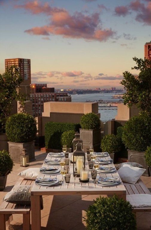 100 Barclay Street, Unit 16G Manhattan, NY 10007 - Photo 21 of 28 a view of a patio with chairs and table