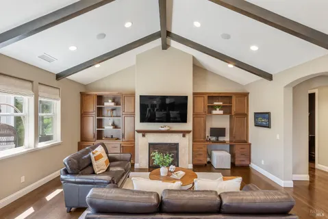 a living room with furniture or fireplace and a flat screen tv