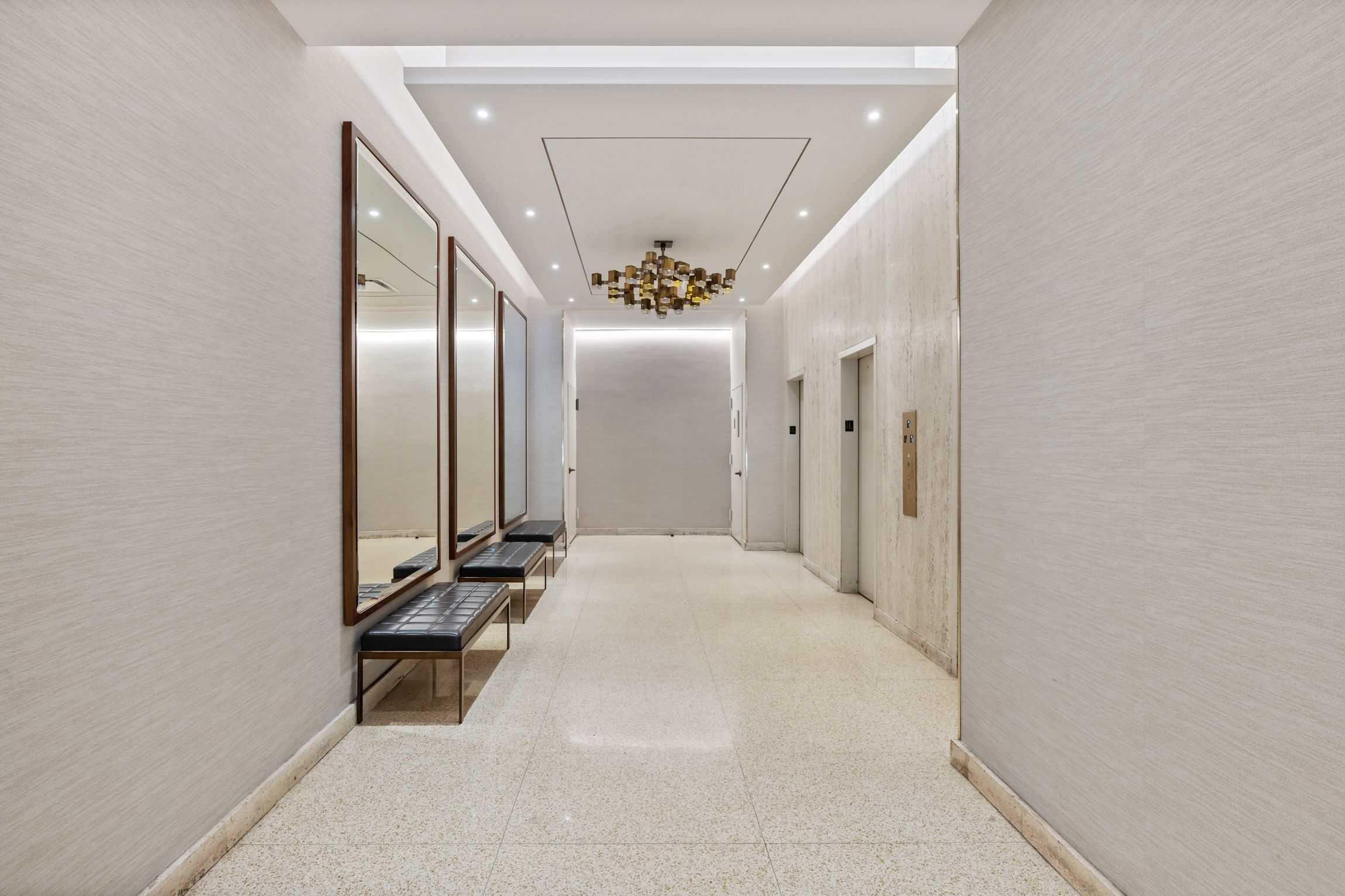 201 East 17th Street, Unit 15H Manhattan, NY 10003 - Photo 19 of 24 a view of a hallway with wooden floor