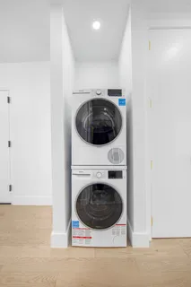 a utility room with washing machine