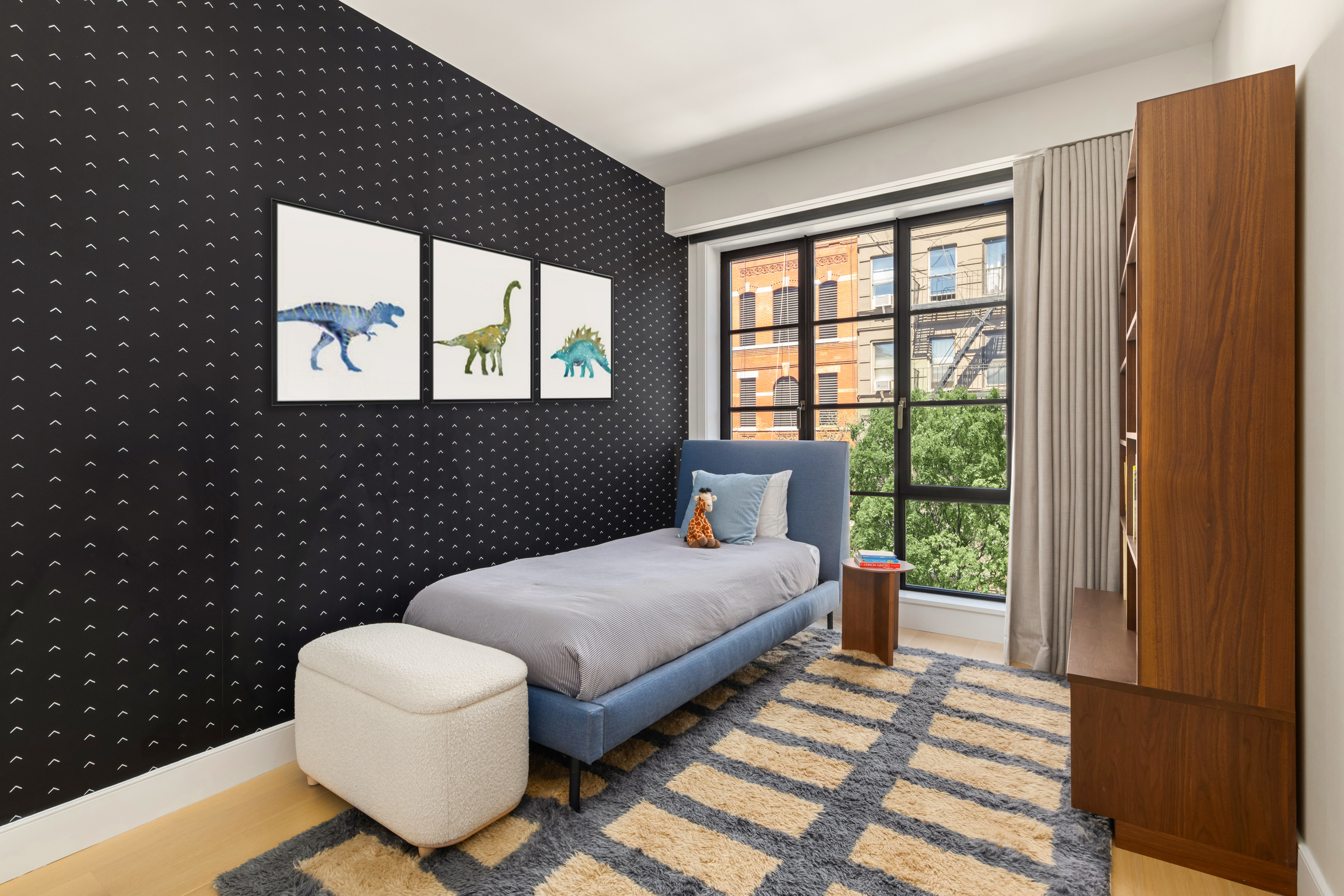 134 West 83rd Street, Unit 4 Manhattan, NY 10024 - Photo 13 of 17 a bedroom with a bed and wooden floor