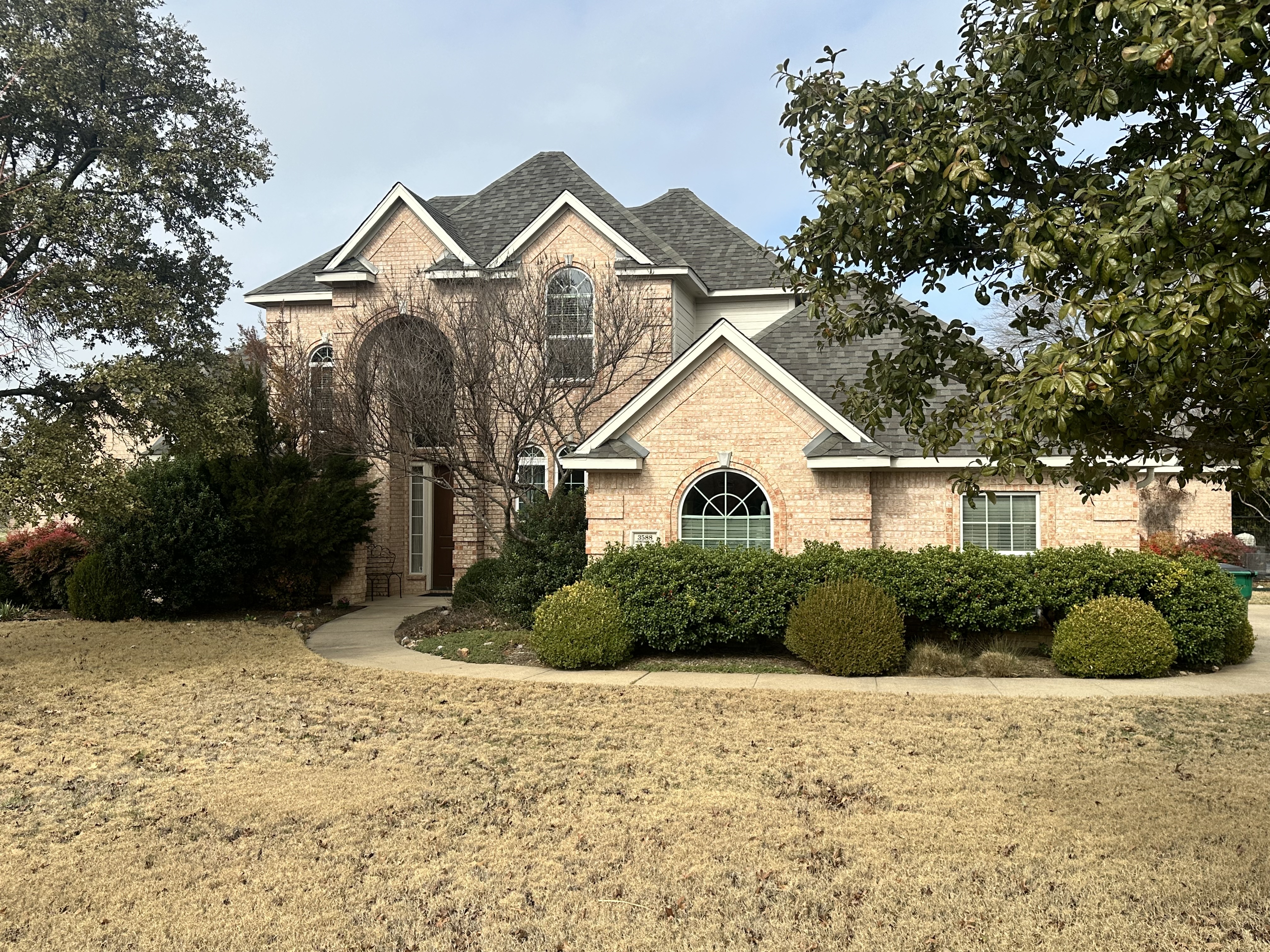 3588 Heritage Trail Celina, TX 75009 - Photo 2 of 19 a front view of a house with a yard