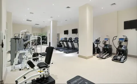 a view of a room with gym equipment