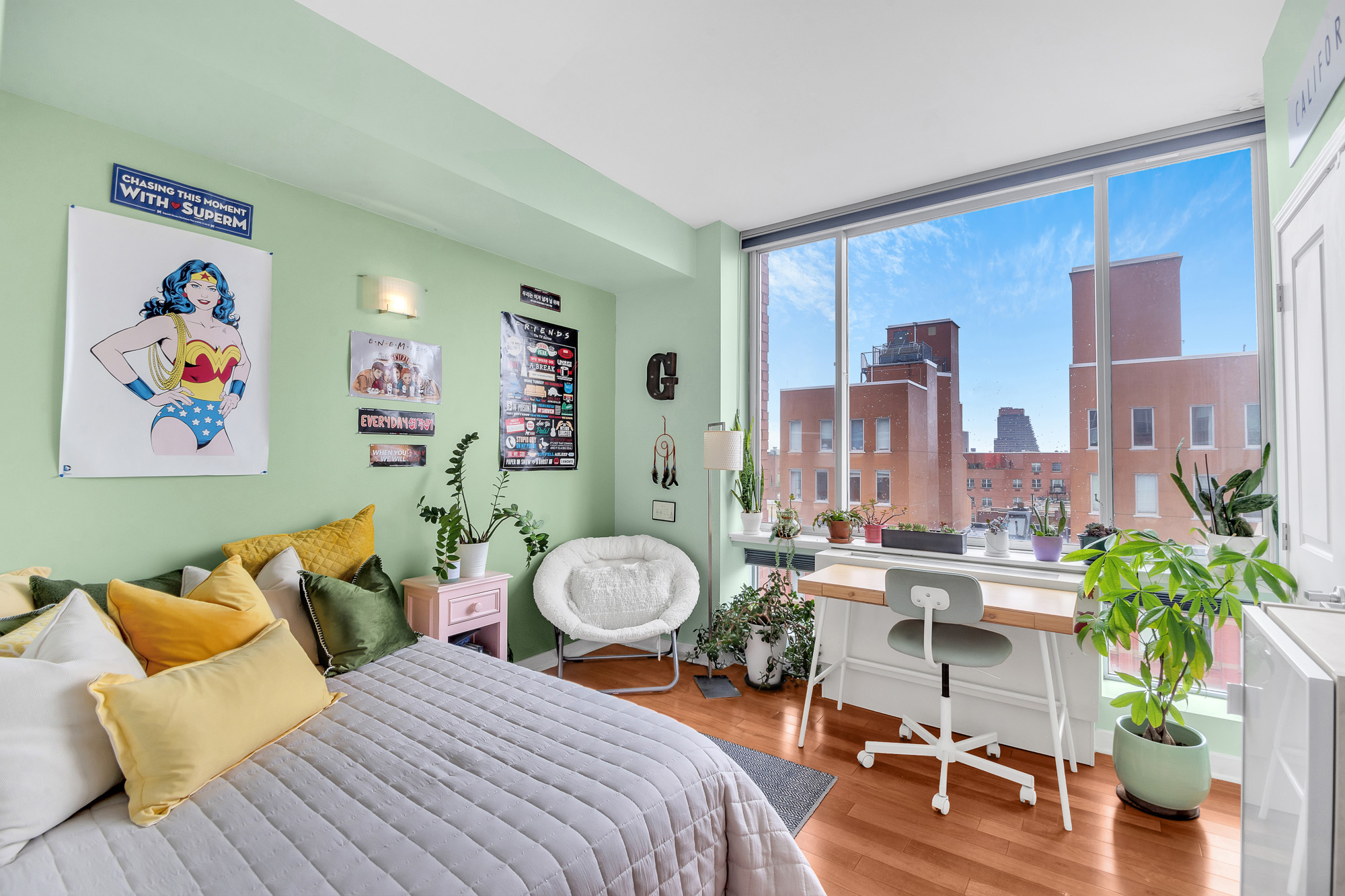 301 West 118th Street, Unit 10G Manhattan, NY 10026 - Photo 11 of 17 a living room with furniture and a large window