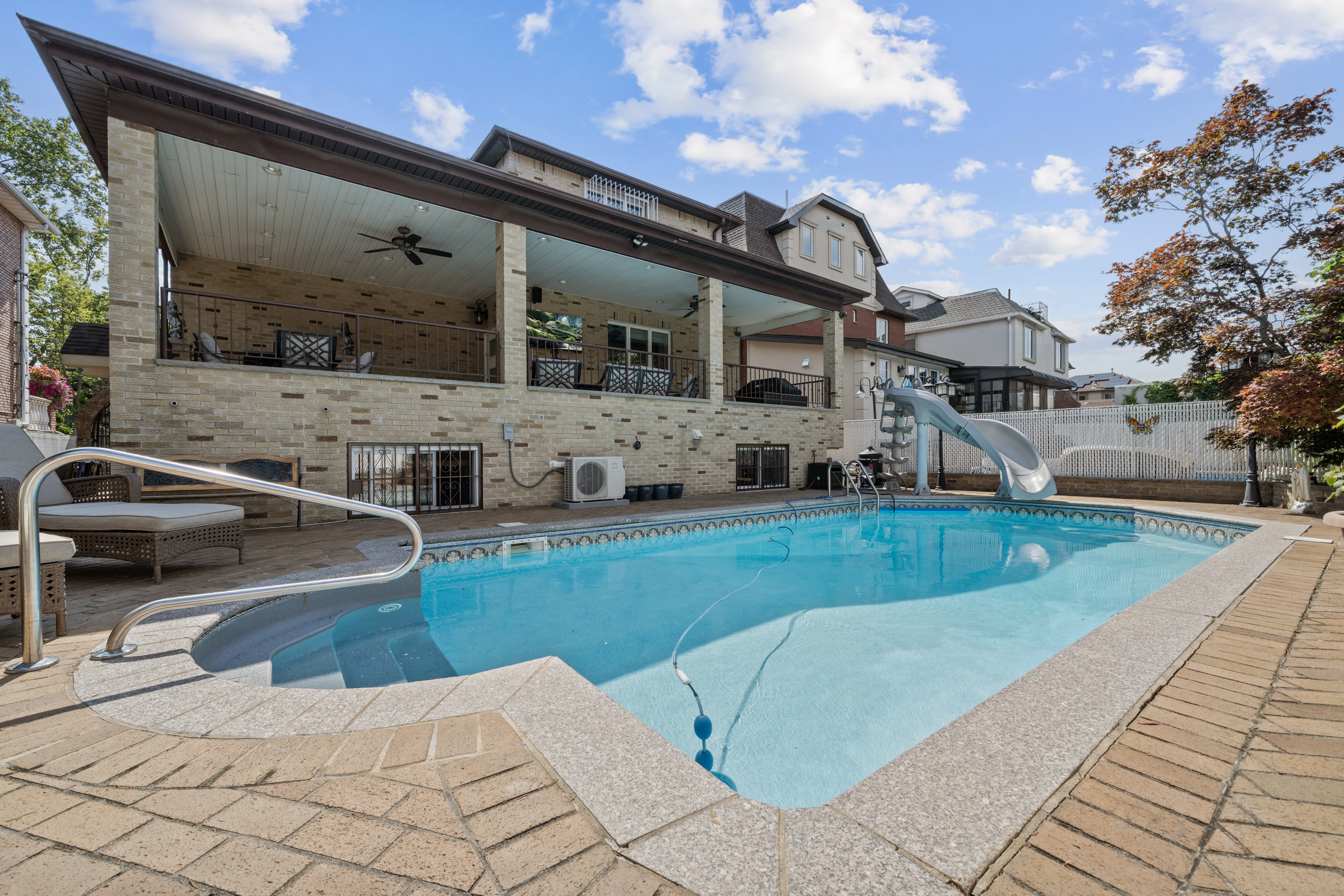 2253 East 64th Street Brooklyn, NY 11234 - Photo 34 of 45 a view of a house with a backyard
