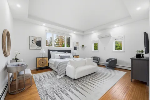 a bathroom with a toilet a sink and a shower