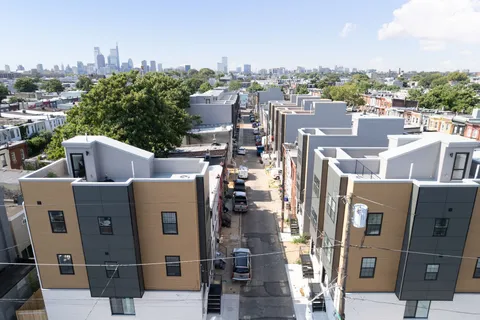 a view of a city with tall buildings