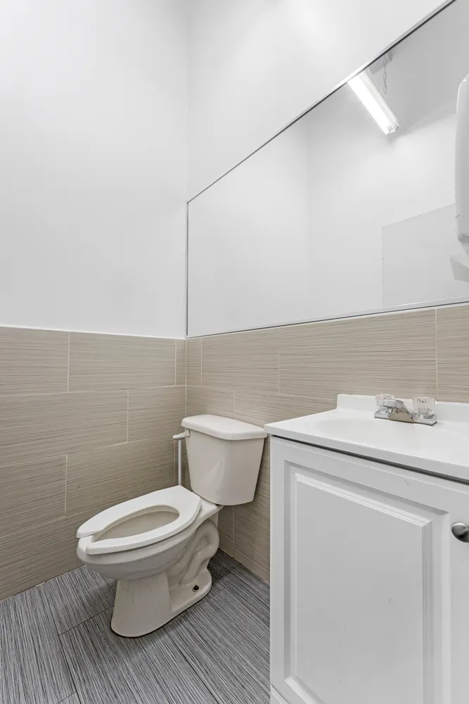 a bathroom with a sink and a toilet