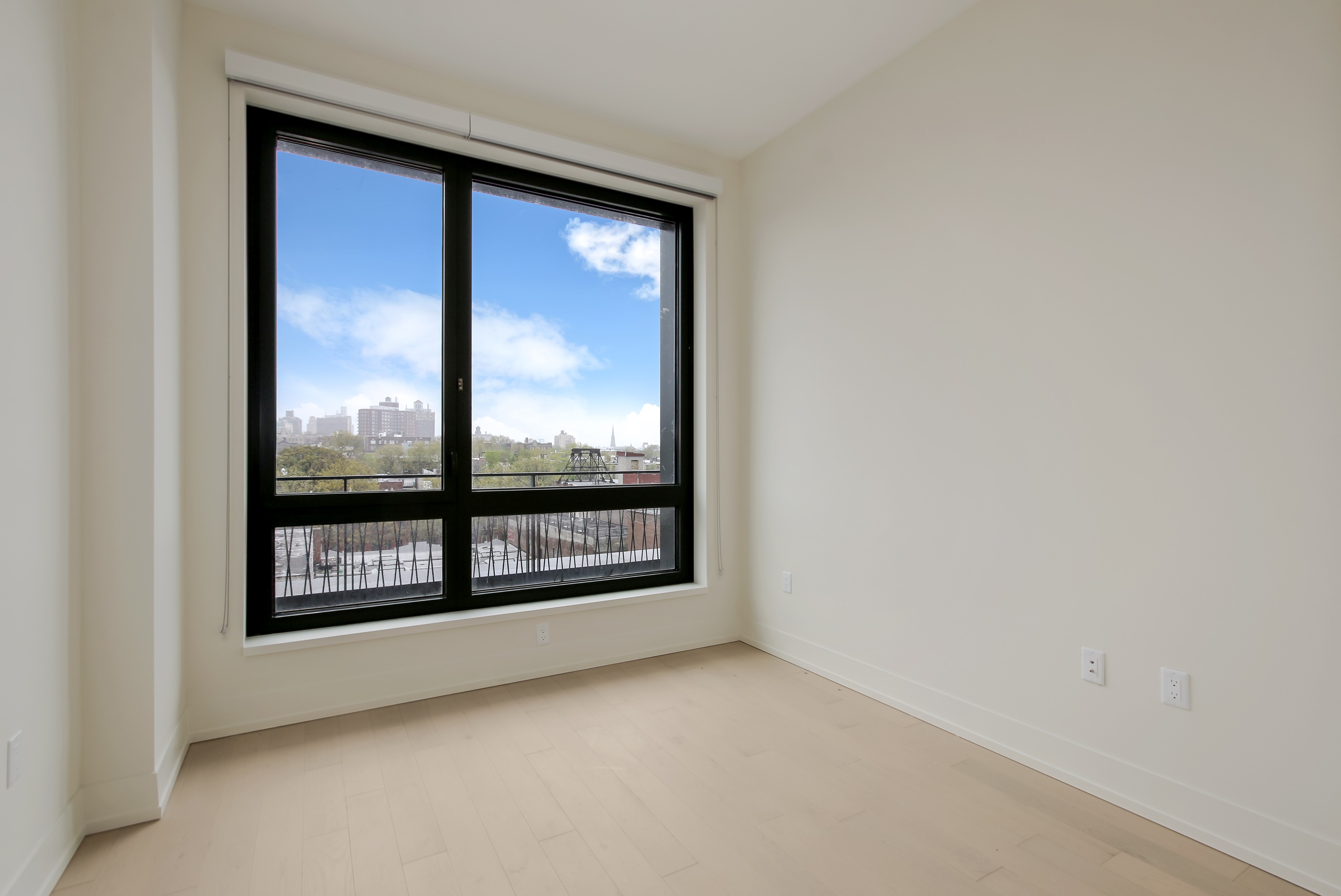 550 Vanderbilt Avenue, Unit 630 Brooklyn, NY 11238 - Photo 6 of 10 a view of an empty room with a window