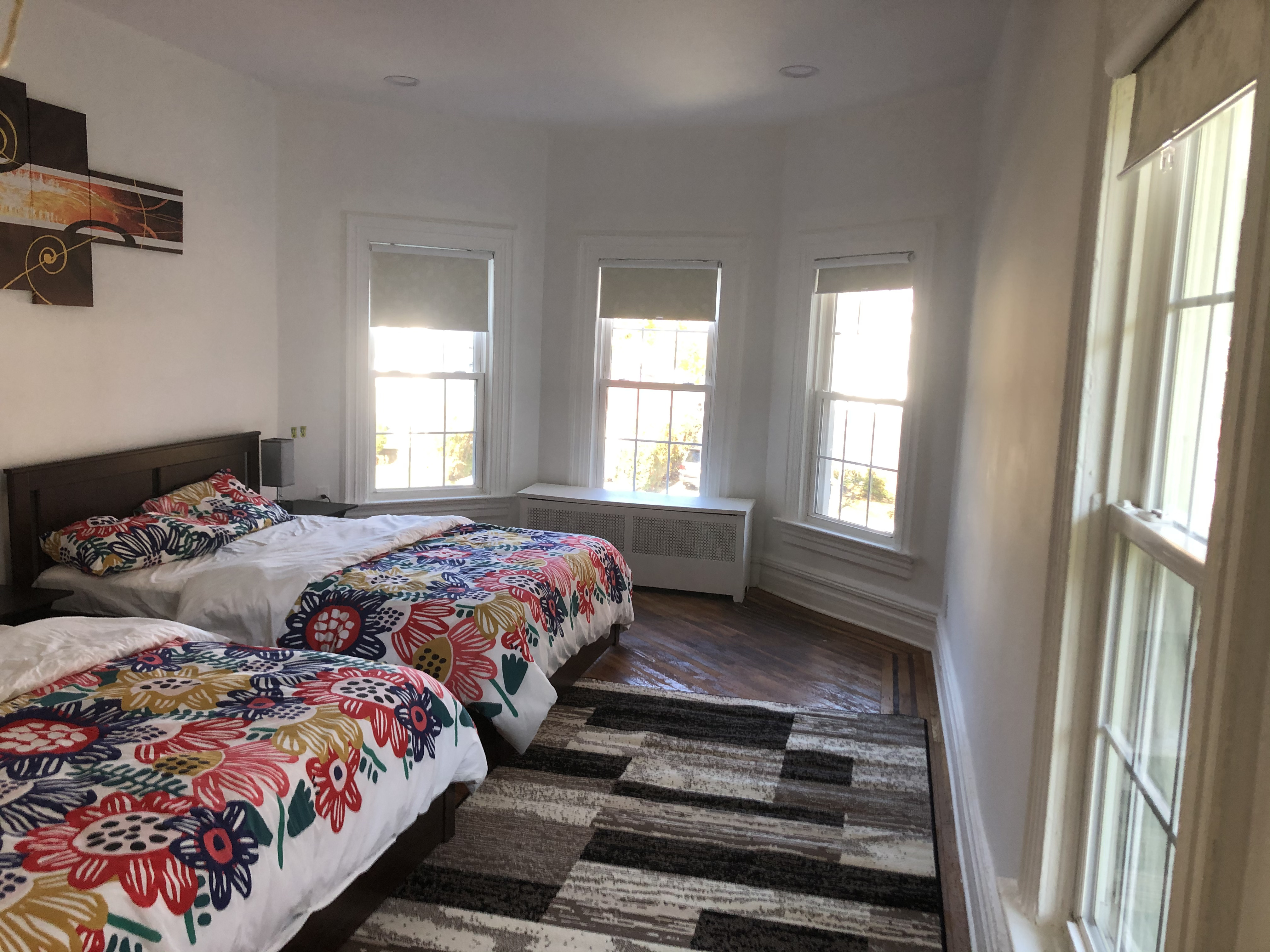 1112 Beverley Road Brooklyn, NY 11218 - Photo 32 of 53 a bedroom with two beds and a window