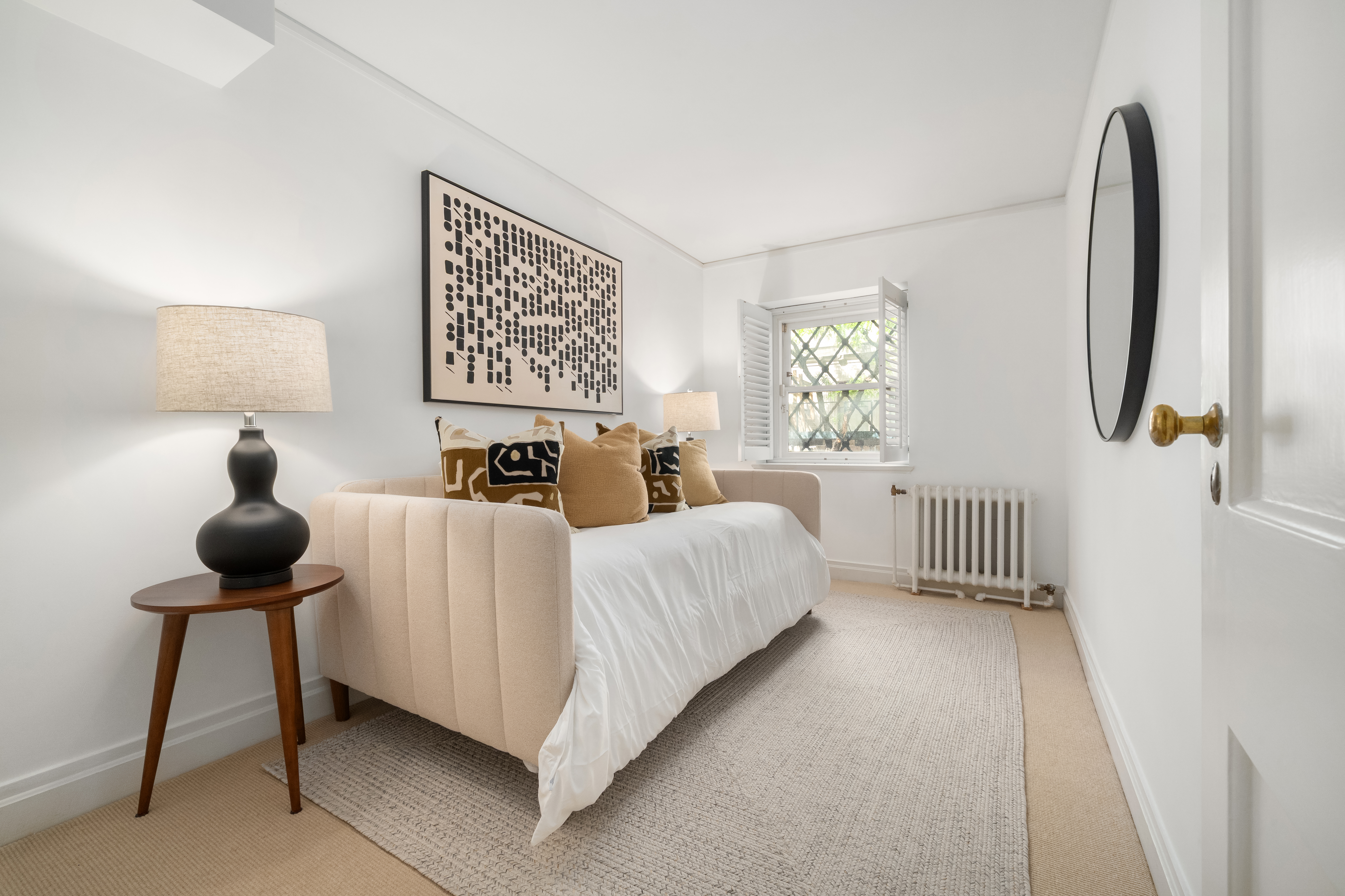 46 East 71st Street Manhattan, NY 10021 - Photo 23 of 27 a bedroom with a bed and a night stand