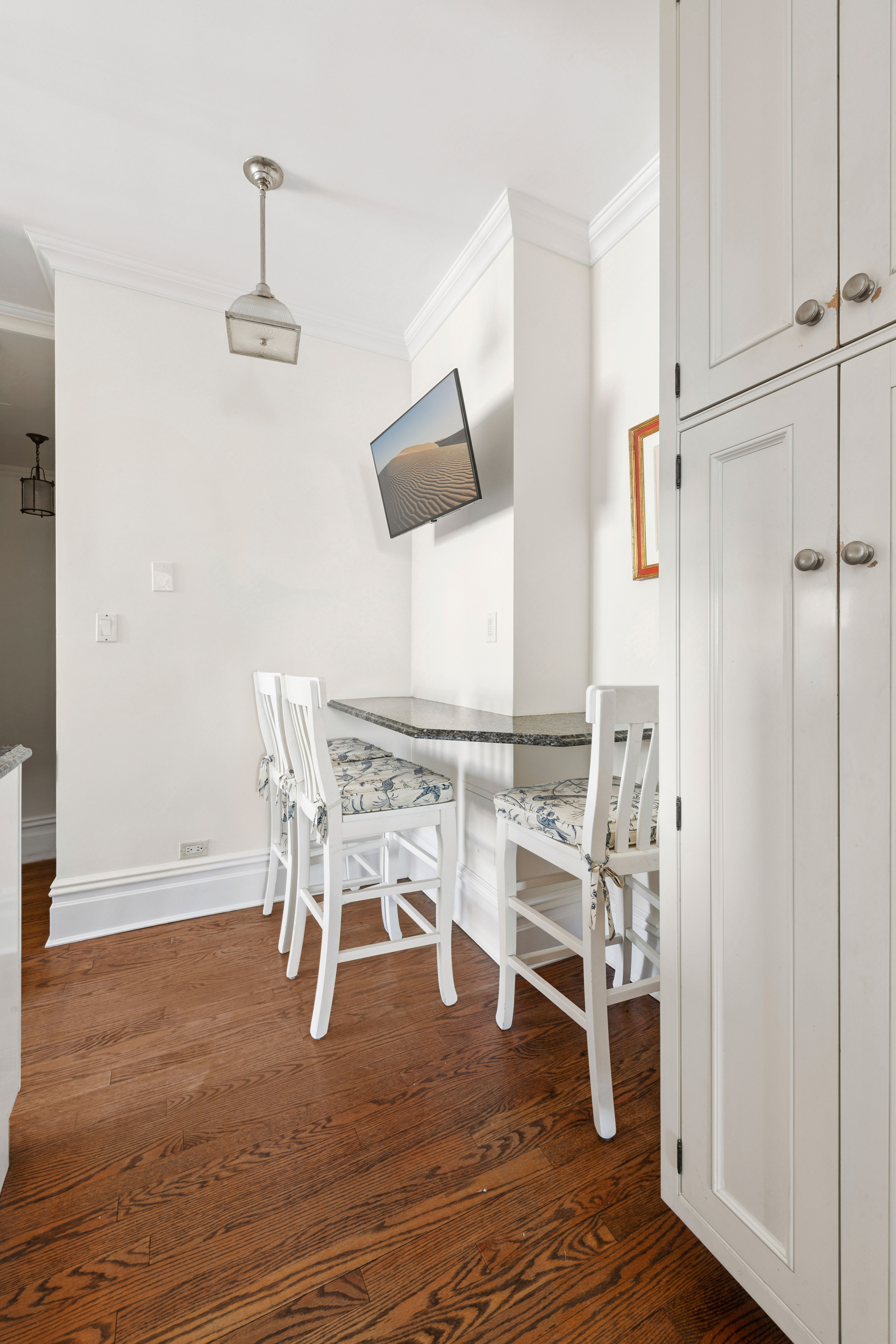 1140 5th Avenue, Unit 14B Manhattan, NY 10128 - Photo 6 of 18 a view of a livingroom with furniture and wooden floor