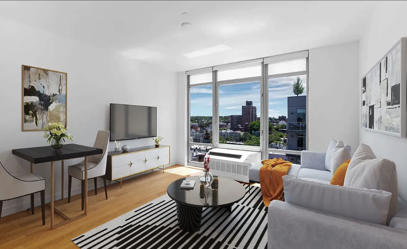267 6th Street, Unit 6J Brooklyn, NY 11215 - Photo 1 of 15 a living room with furniture and a flat screen tv