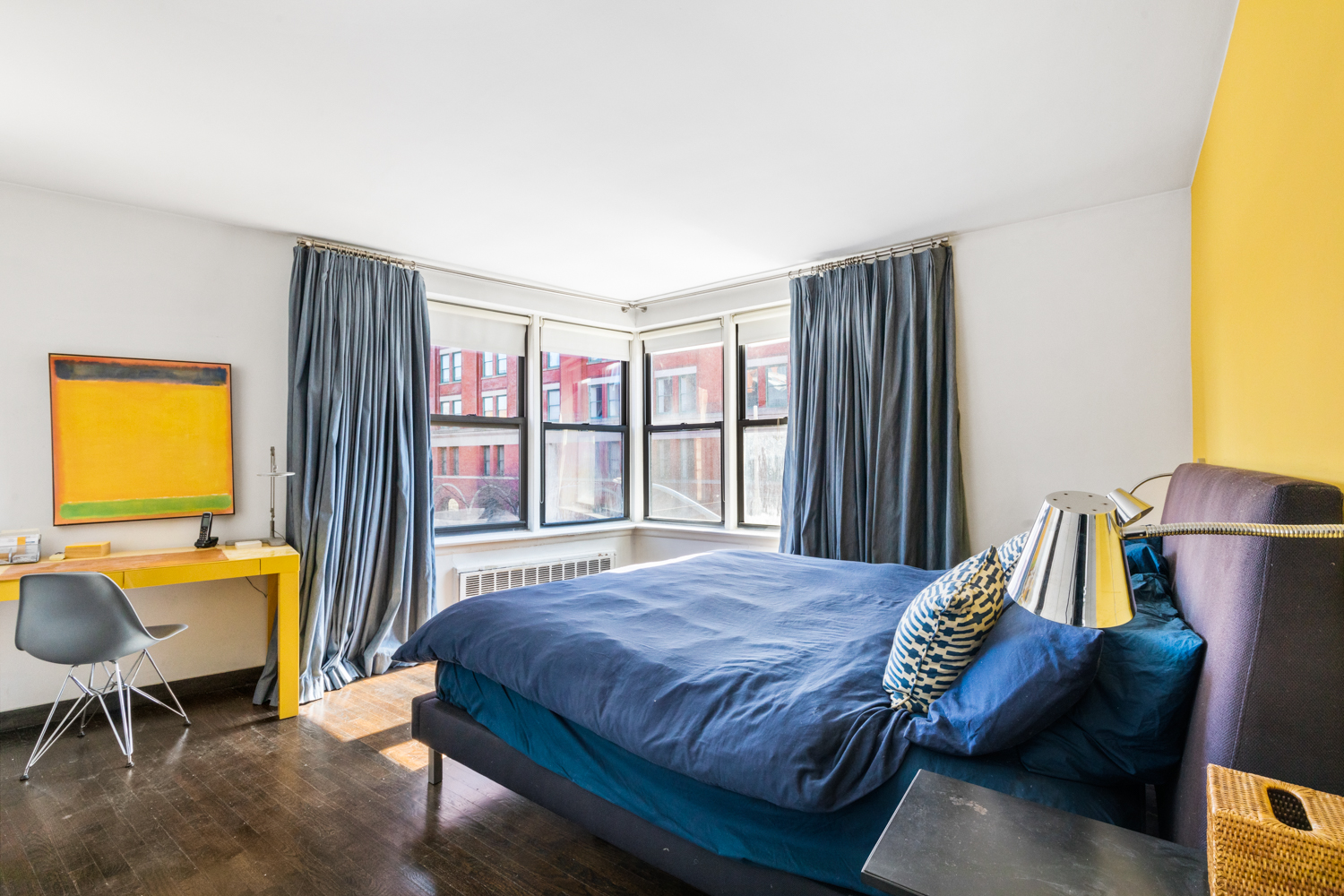 165 Christopher Street, Unit 3I Manhattan, NY 10014 - Photo 11 of 20 a bedroom with a bed and a dresser next to a window
