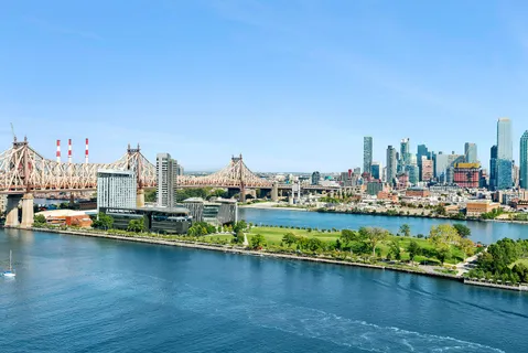 a view of a city with tall buildings