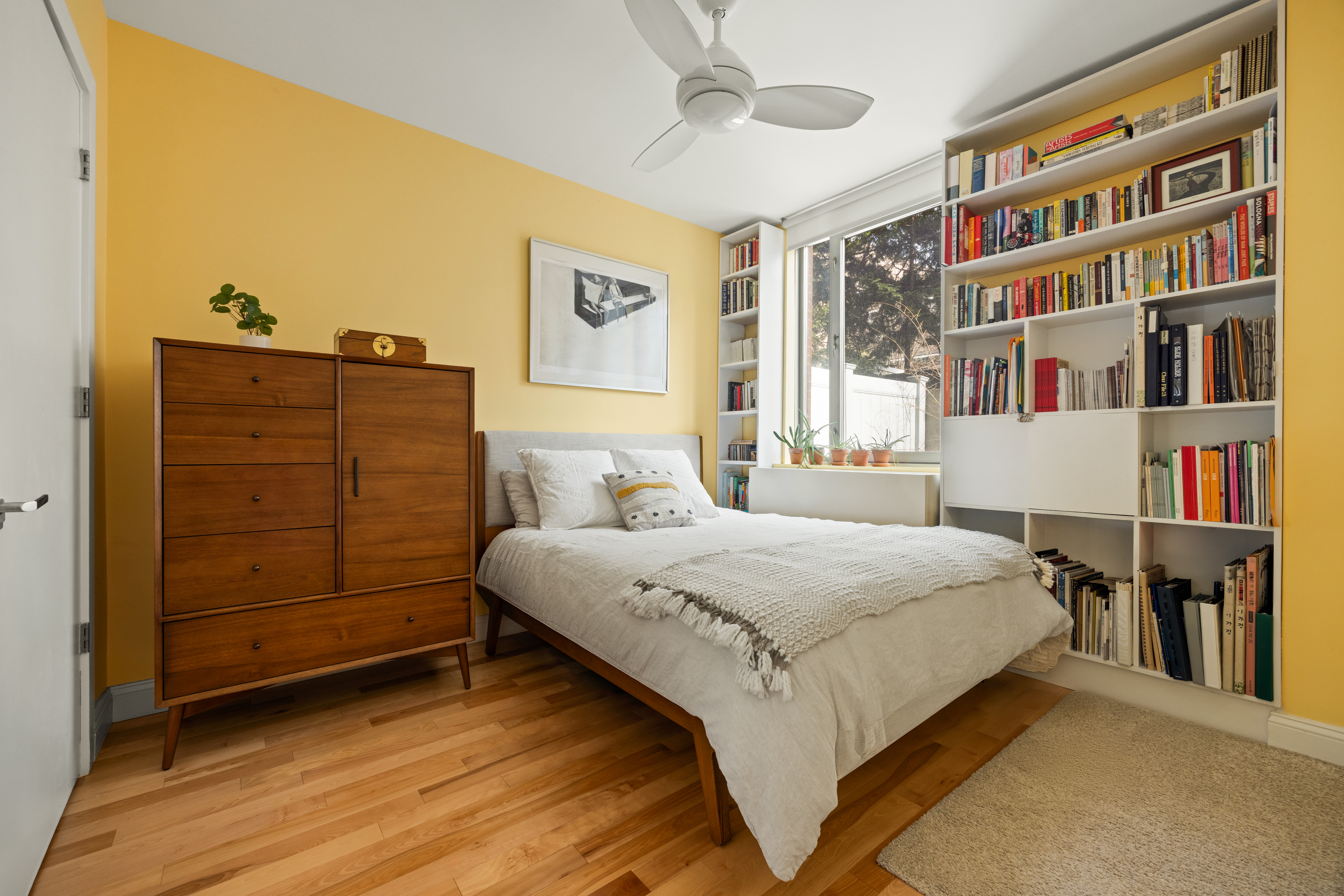35 McDonald Avenue, Unit 1E Brooklyn, NY 11218 - Photo 6 of 9 a bedroom with a bed and closet