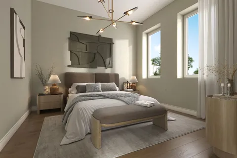 a bed room with a bed and a window