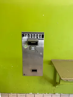 a view of a wall with sitting area