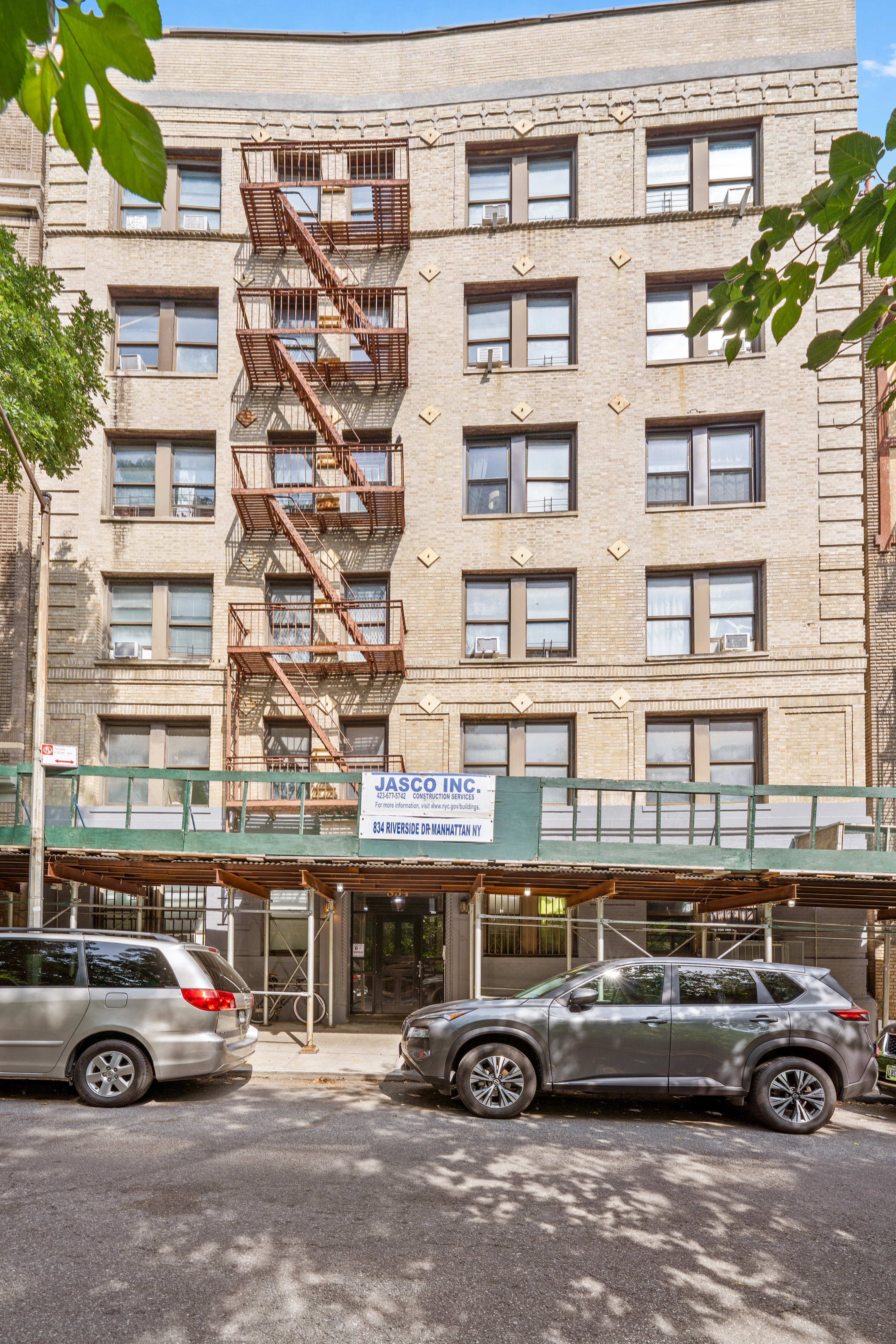 834 Riverside Drive, Unit E6 Manhattan, NY 10032 - Photo 5 of 22 a front view of a building with parking space