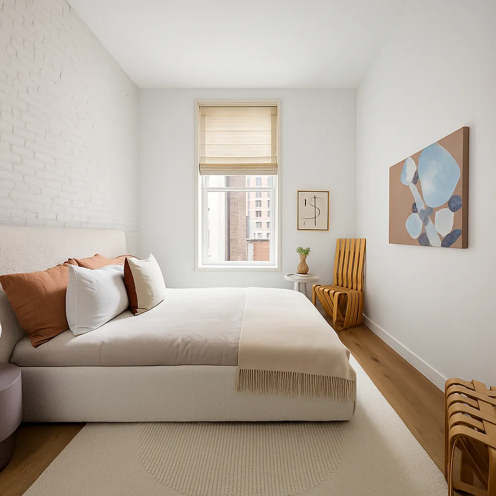 a bedroom with a bed and a couch