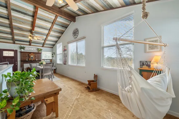 a view of a lake with houses in the back