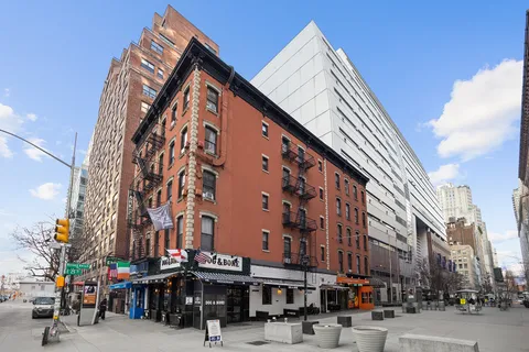 a view of a building and a street