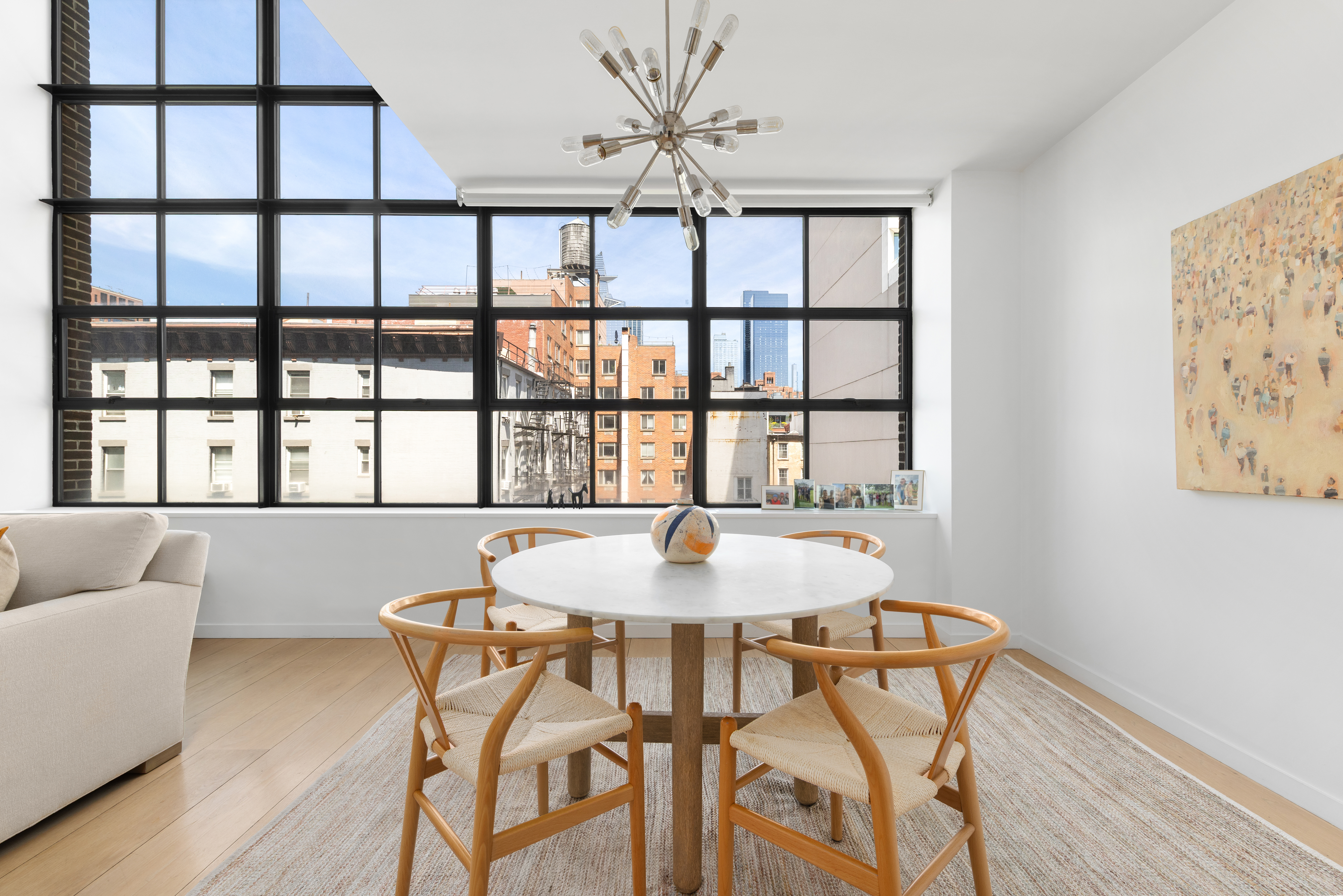456 West 19th Street, Unit 4/5A Manhattan, NY 10011 - Photo 3 of 15 a dining room with furniture and window