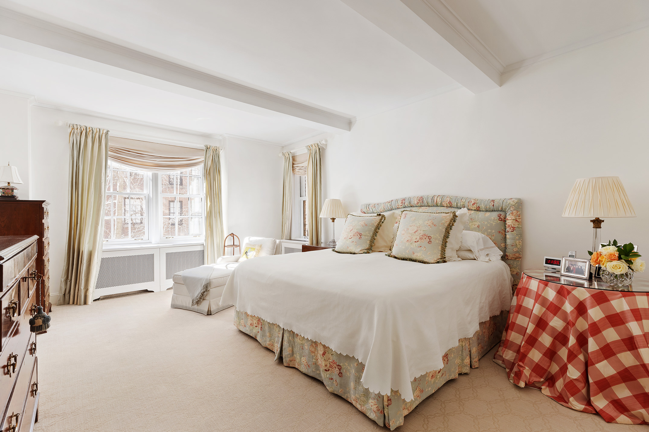 133 East 80th Street, Unit 3A Manhattan, NY 10075 - Photo 6 of 19 a bedroom with bed and a flat tv screen on a dresser