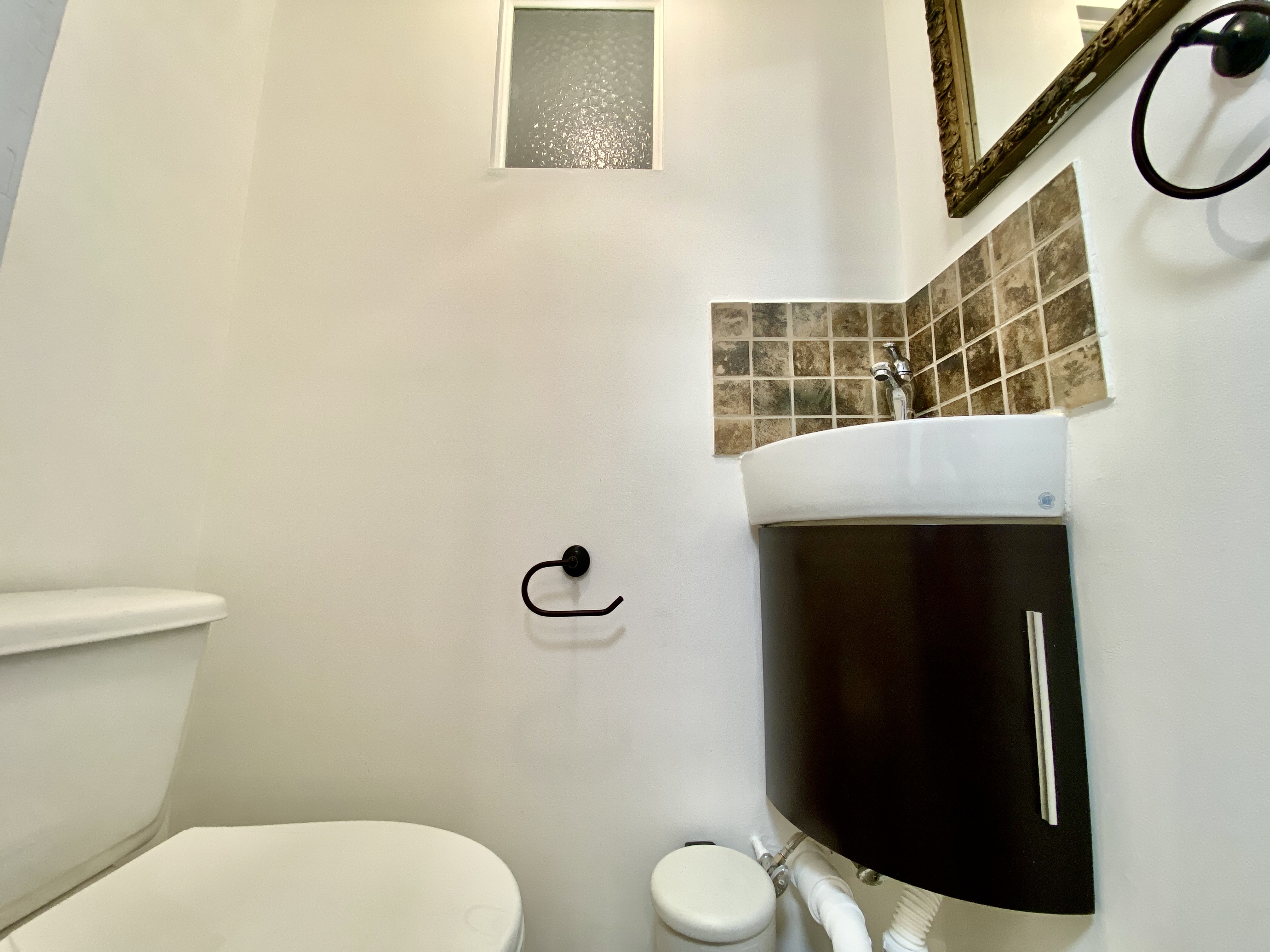 447 Degraw Street, Unit 1 Brooklyn, NY 11217 - Photo 6 of 11 a bathroom with a toilet and a sink
