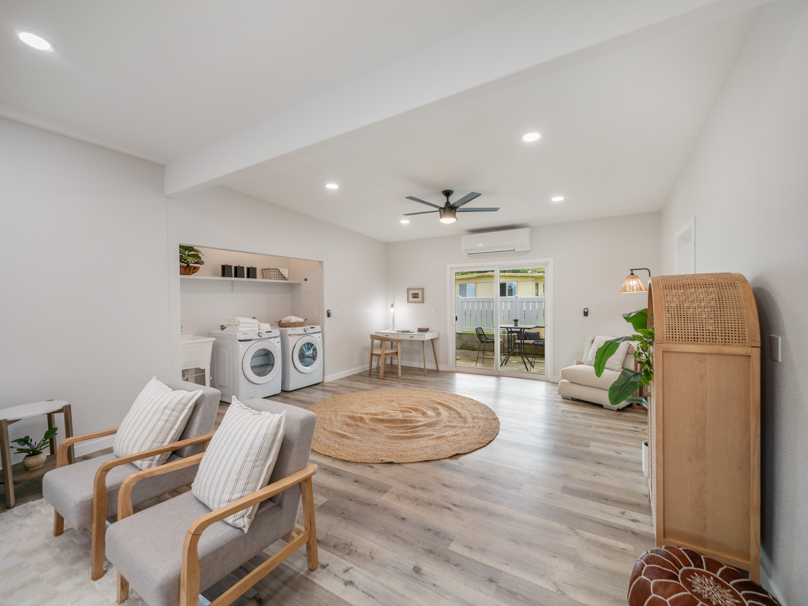 45-561 Paleka Road, Unit C Kaneohe, HI 96744 - Photo 9 of 27 a living room with furniture and wooden floor