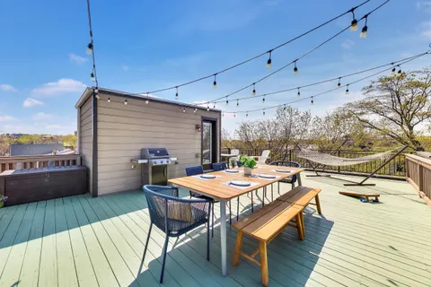 a view of a terrace with furniture