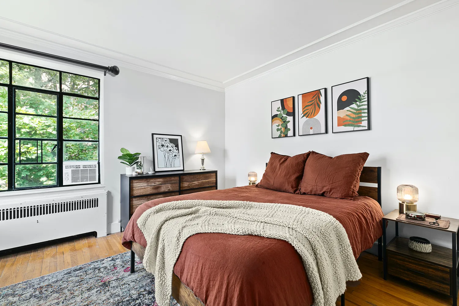a bedroom with bed and a window